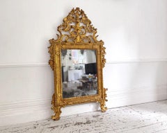 An 18th C Italian Piedmont Carved Giltwood Mirror