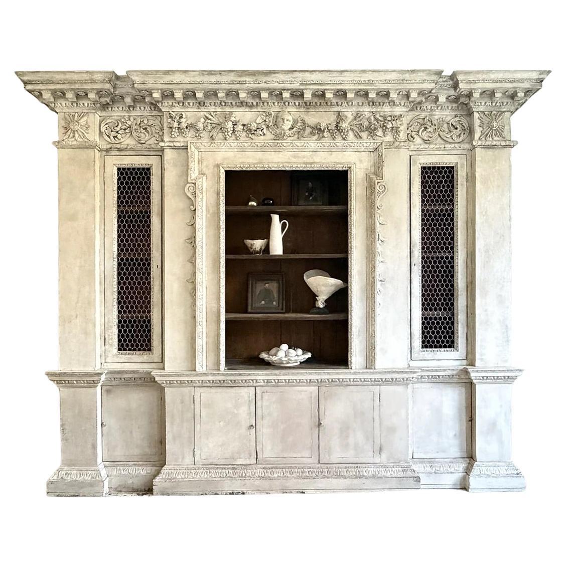 An 18th C Breakfront Bookcase in the manner of William Kent