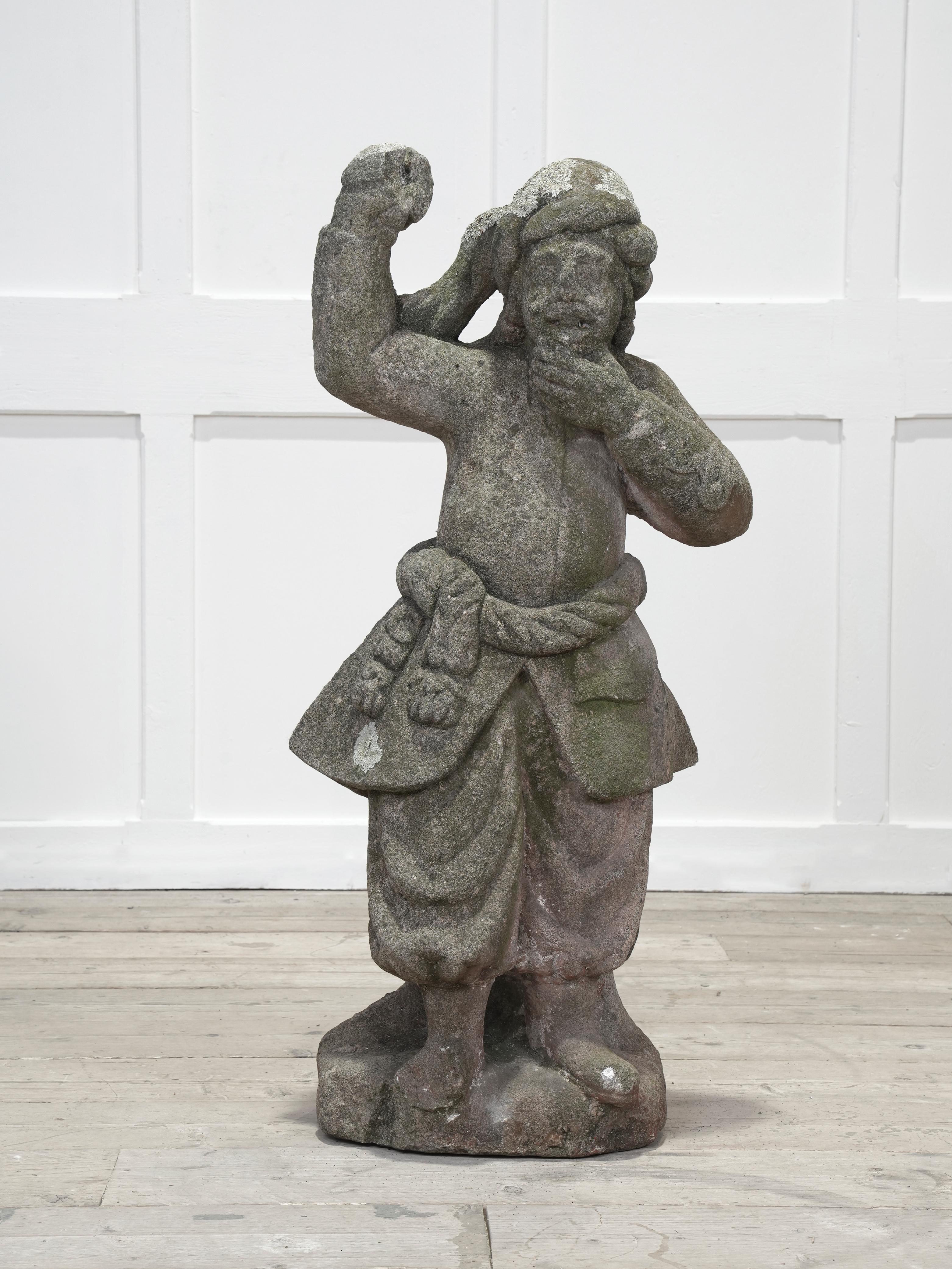 Eine geschnitzte Schottersteinfigur eines türkischen Kriegers in traditioneller Kleidung, der mit einer erhobenen Hand ein Bronzeschwert hält.

Niederländische Länder, Mitte des 18. Jahrhunderts.