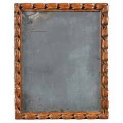 An 18th Century Carved Walnut Mirror