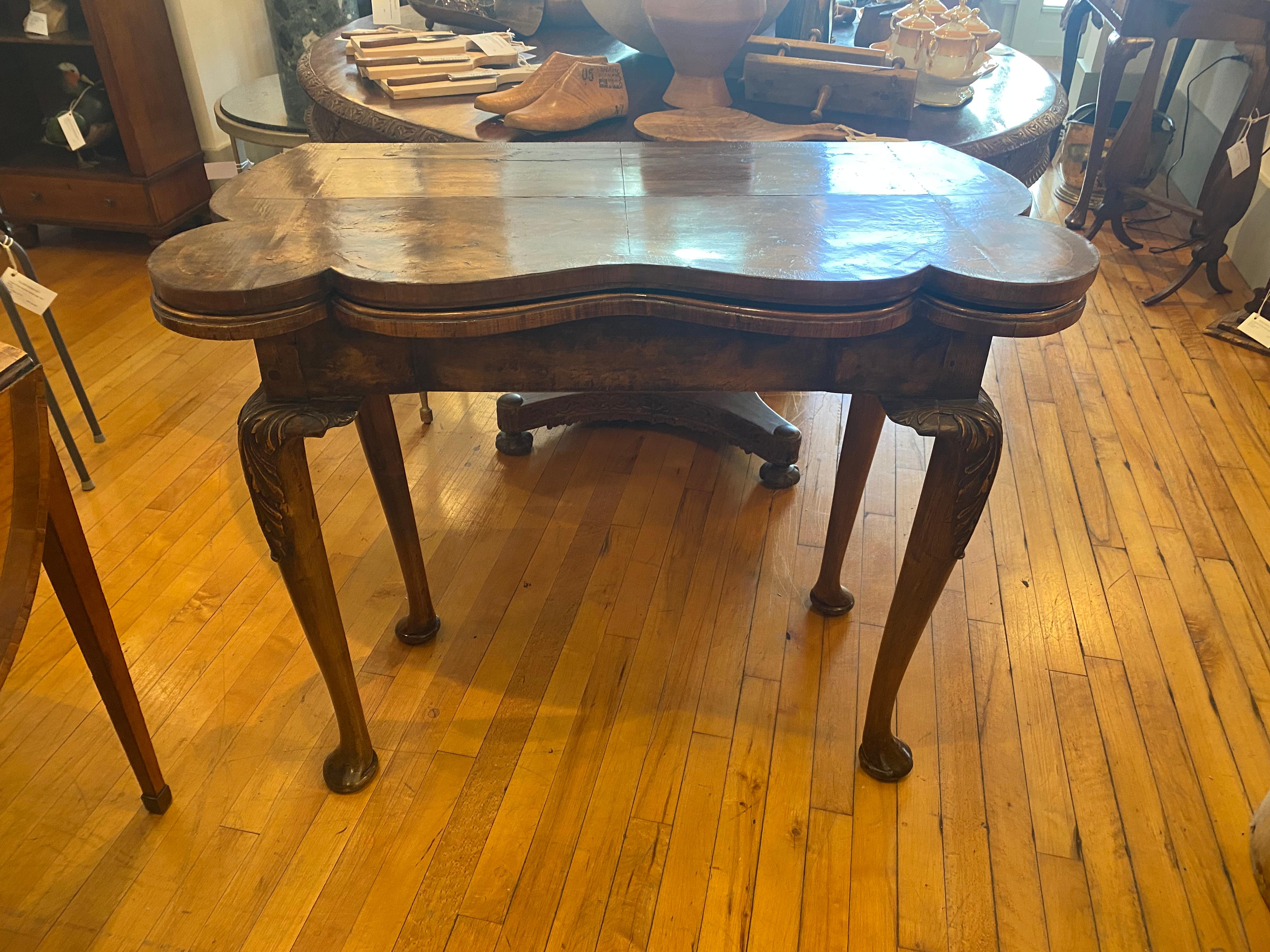 An 18th Century English Walnut Flip Top Games Table, Accordian Base, Great Color.