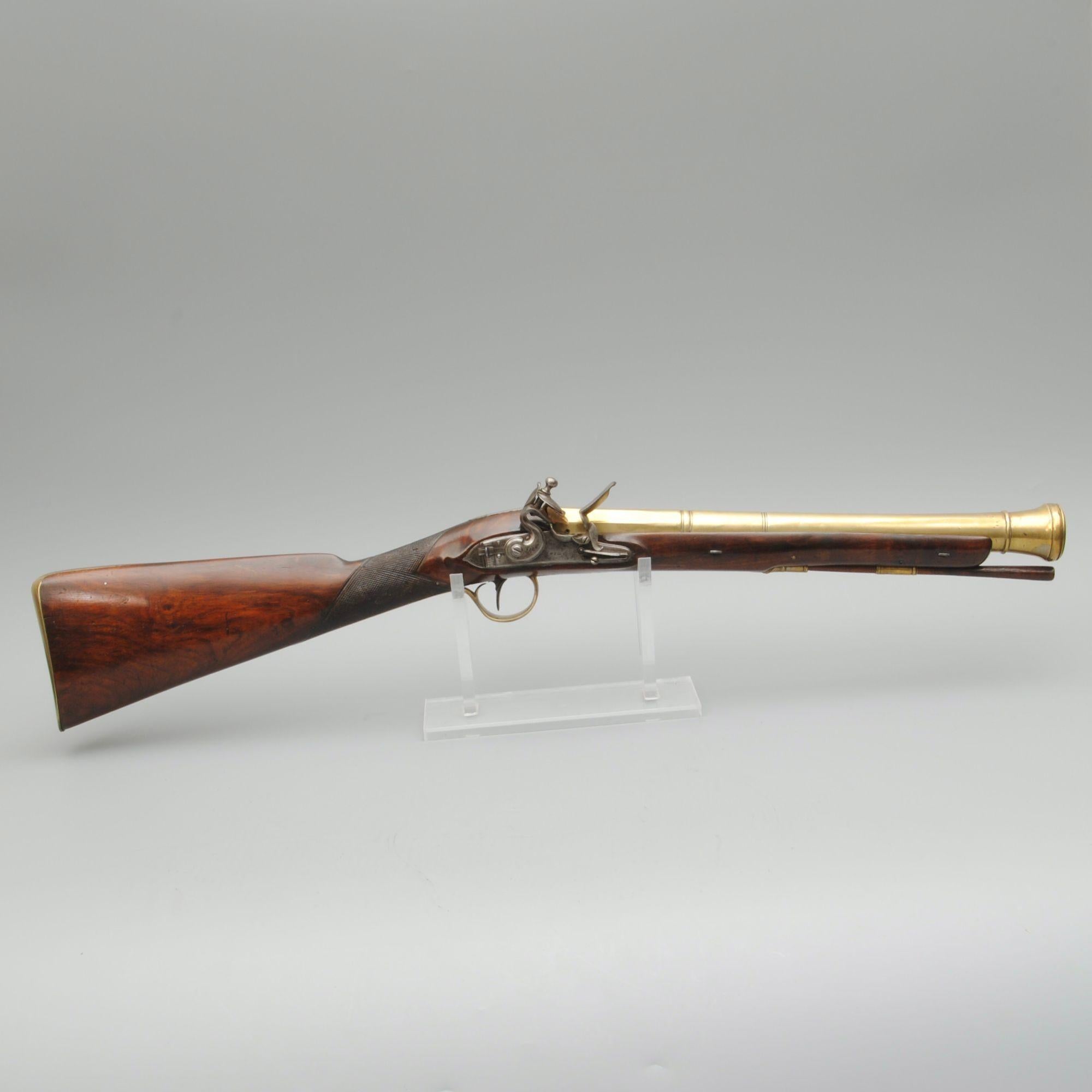 A fine example of a brass barrelled blunderbuss by the famous maker Twigg. The three staged barrel is signed London. Good colour to the walnut stock which is fully brass mounted with engraved details. The lock signed Twigg.
Circa 1795
Barrel