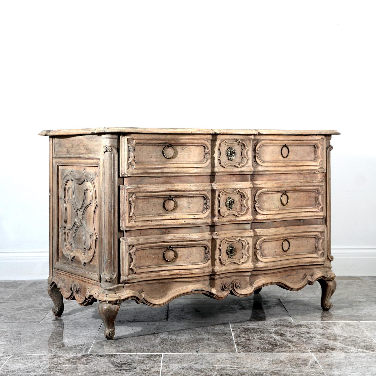 Vagabond Antiques presents an 18th century French commode

France, last quarter of the 18th century

”An 18th century walnut commode, subtly washed back to a smooth, paler hue”.