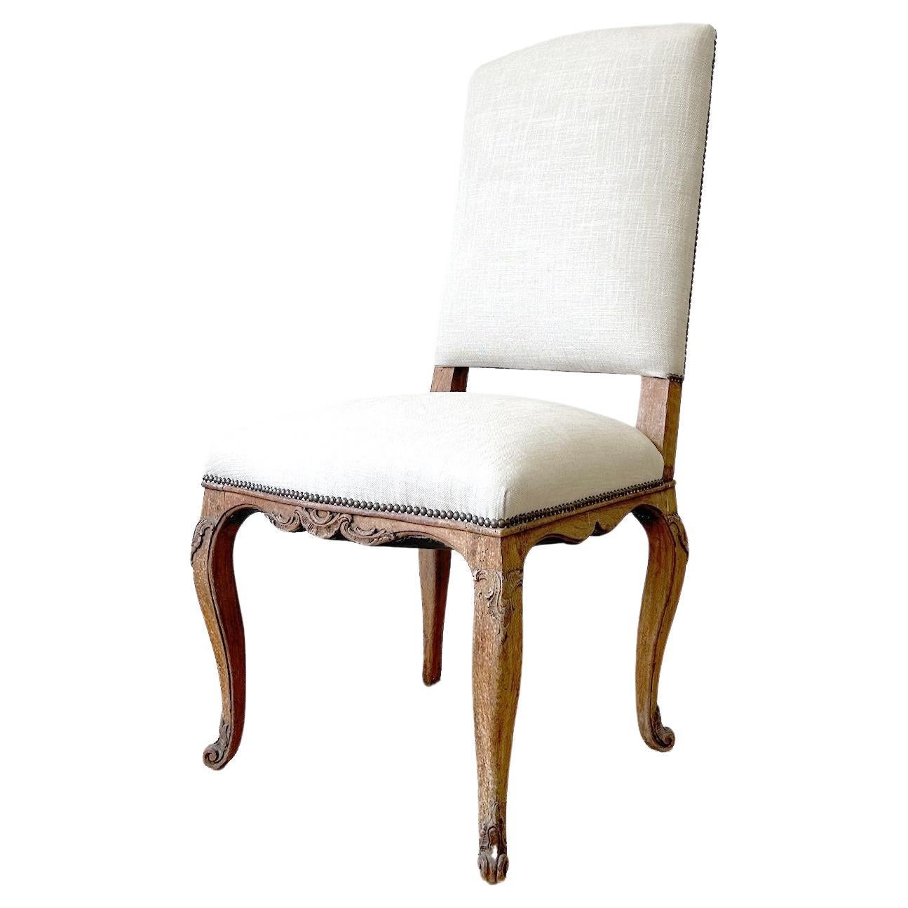 An 18th Century French Side Chair Newly Upholstered in Linen For Sale