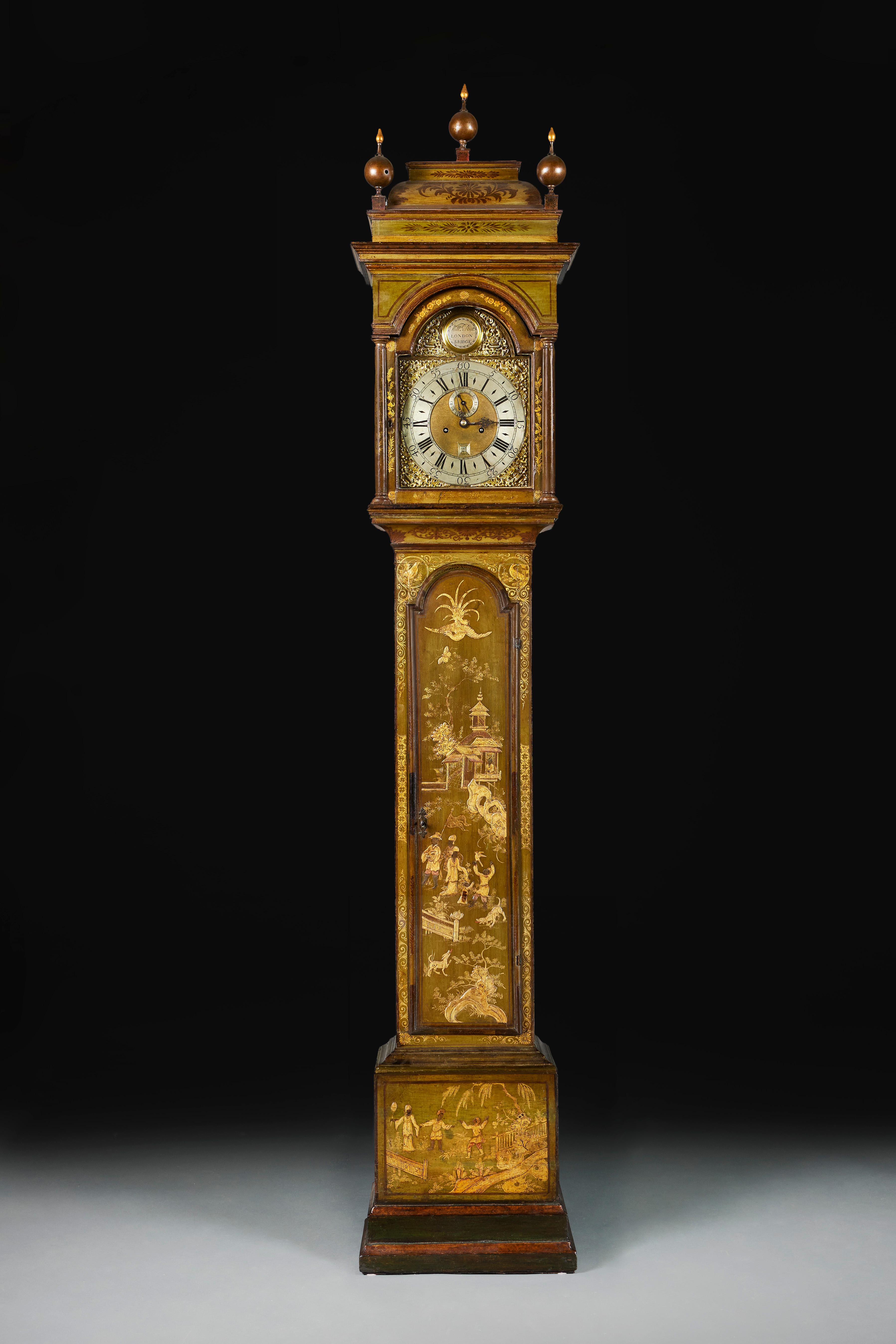 England, circa 1780

A mid-eighteenth century green japanned lacquer longcase clock, the case decorated with figures within a naturalistic setting surrounded by pagodas, birds, butterflies and dogs. The arched hood with three spherical finials