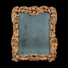 Miroir mural baroque italien du XVIIIe siècle, en bois rouge et doré