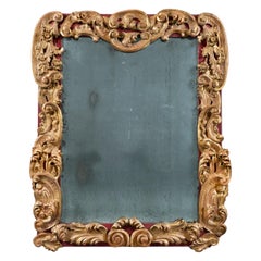 Miroir mural baroque italien du XVIIIe siècle, en bois rouge et doré
