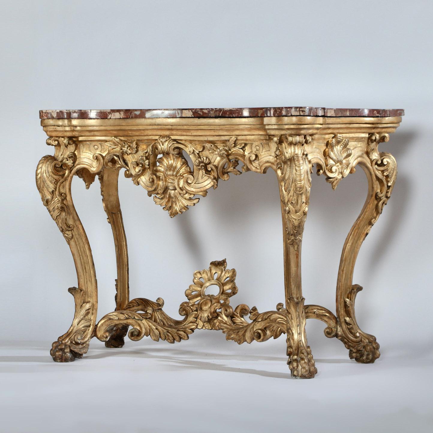 A beautiful 18th century Italian console table with a rich, red, veneered marble top

Italy, Circa 1770

