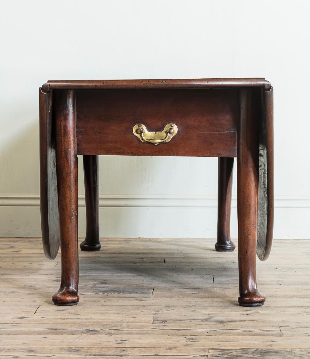 With gilt brass carrying handles, c.1730

Height: 77 cm, 30 1/4″
Length: 223 cm, 87 3/4″
Width with leaves up: 208 cm, 81 7/8″
Width with leaves down: 71 cm, 28″