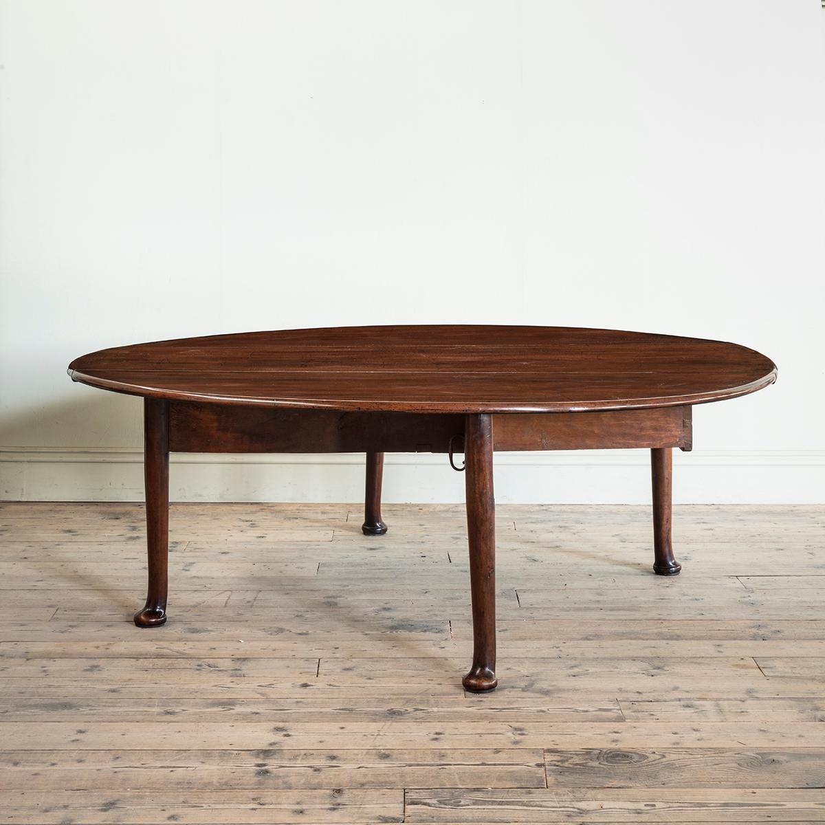 Brass An 18th Century Large Scale Drop Leaf Dining Table with Robust Pad Feet For Sale