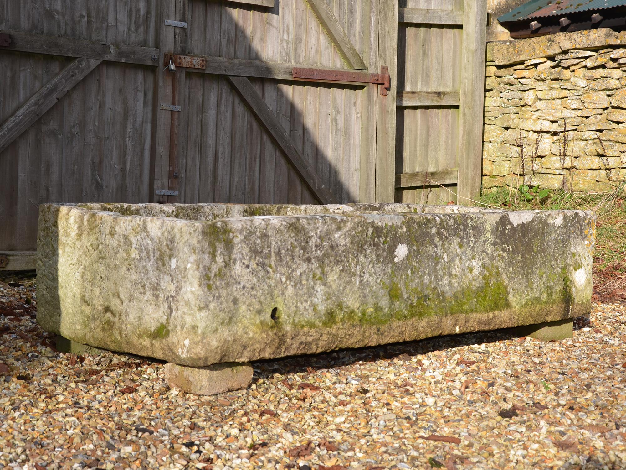 An 18th century large stone trough with good weathering and patination.