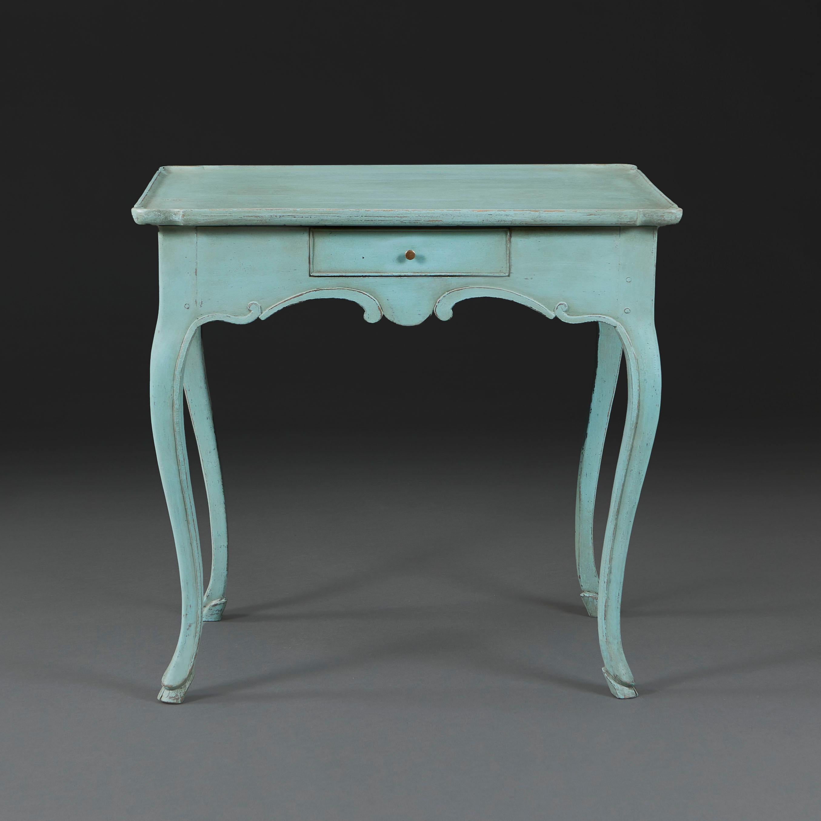 France, circa 1780

A late eighteenth century Louis XVI table with scrolling legs, the top with scalloped corners and with single drawer to the frieze, the legs terminating in hoof feet, with later blue paintwork.

Height 72.00cm
Width 77.00cm
Depth