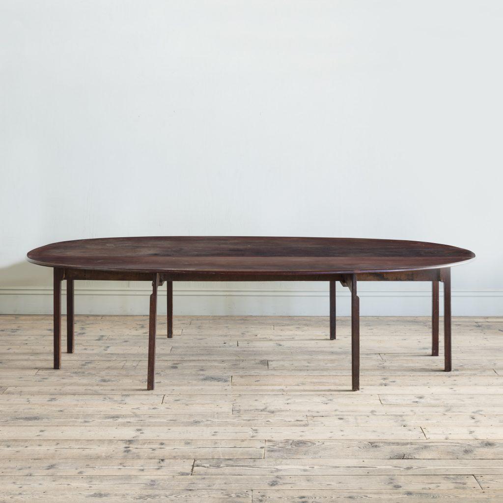An 18th century mahogany hunt table of exceptional colour and well figured top, on gateleg action on square straight legs.

Width: 288 cm, 113 3/8″
Depth: 168 cm, 66 1/8″
Height: 71 cm, 28″

