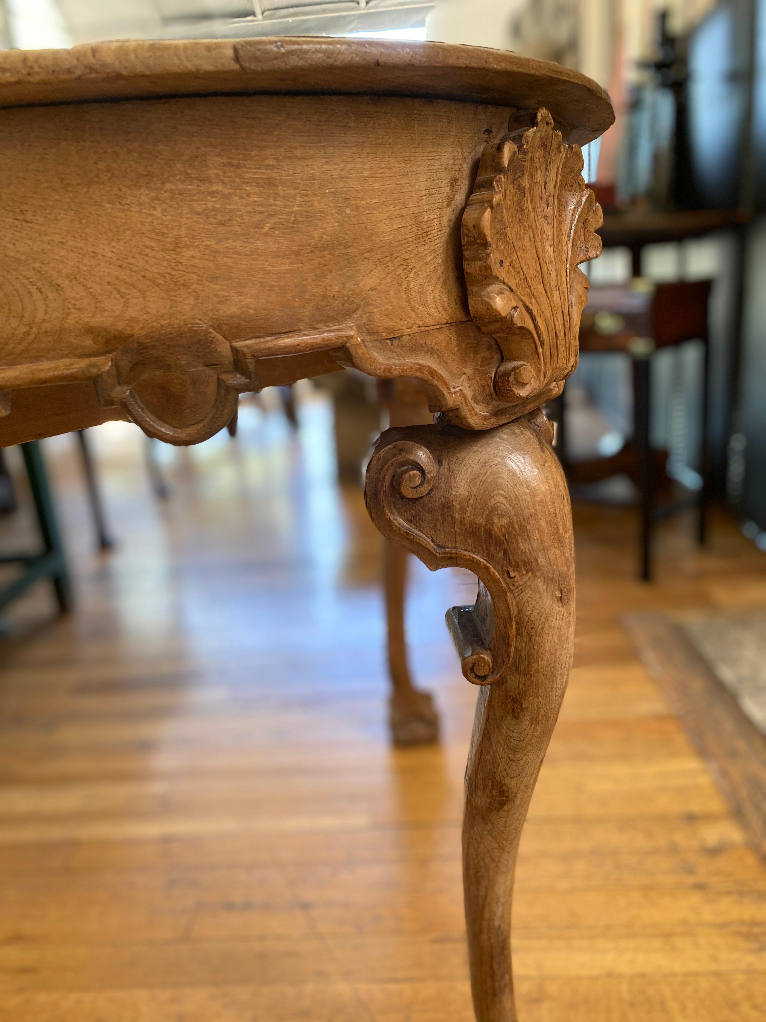 Rare Mexican Chippendale table made from Sabino pine wood. Beautiful carving.