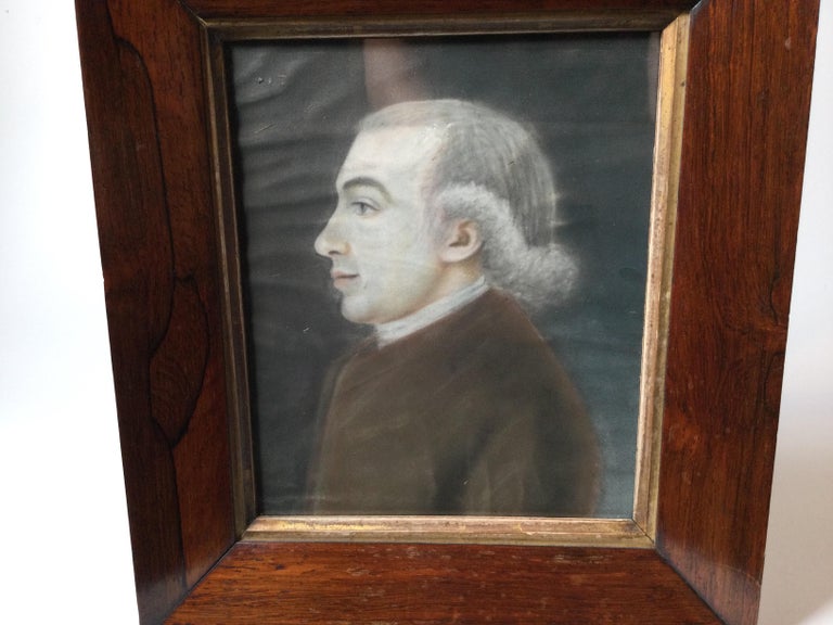 A very nice portrait of a gentleman in a rosewood frame. On paper, under glass with early frame. 13 inches high, 11.5 inhces wide.