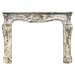 An 18th Century Period French Louis XV Breche Violette Marble Fireplace Mantel