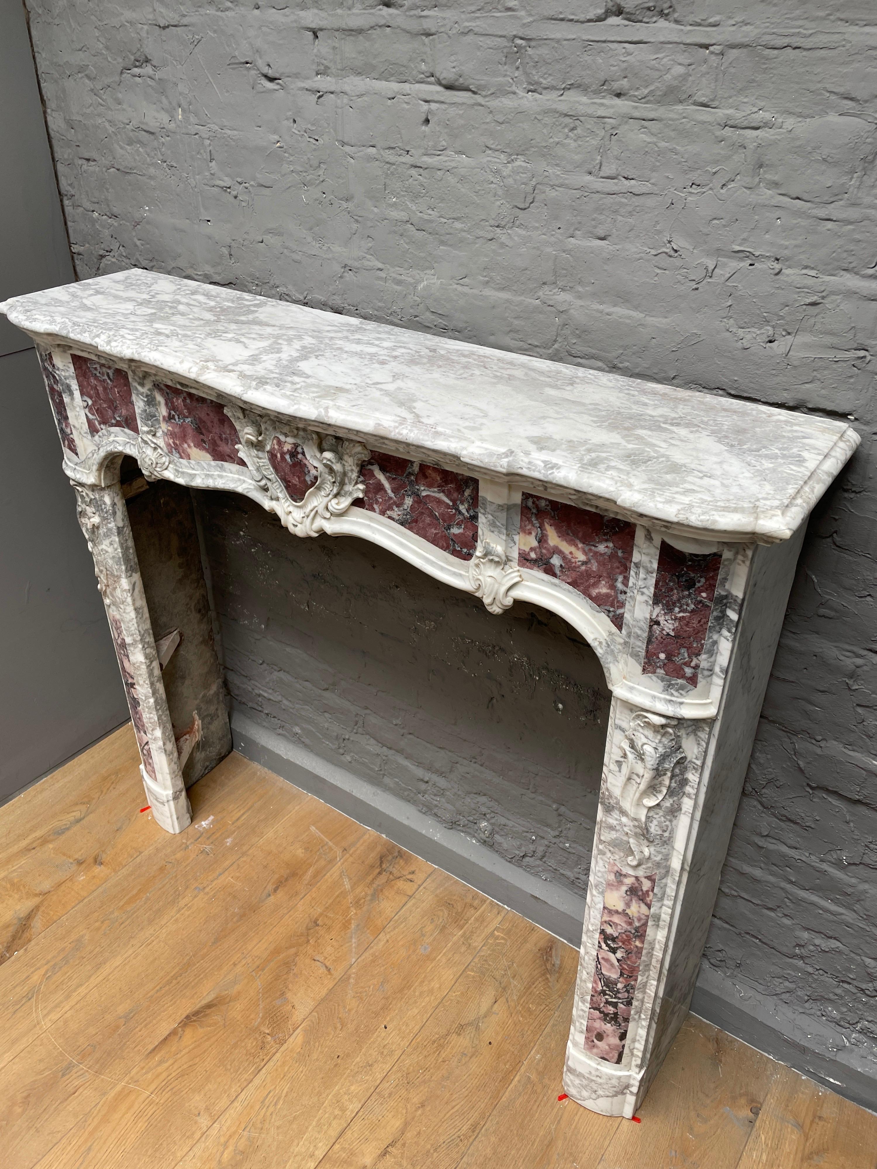 Carved An 18th Century Provincial Louis XV  Style Marble Fireplace Mantel For Sale
