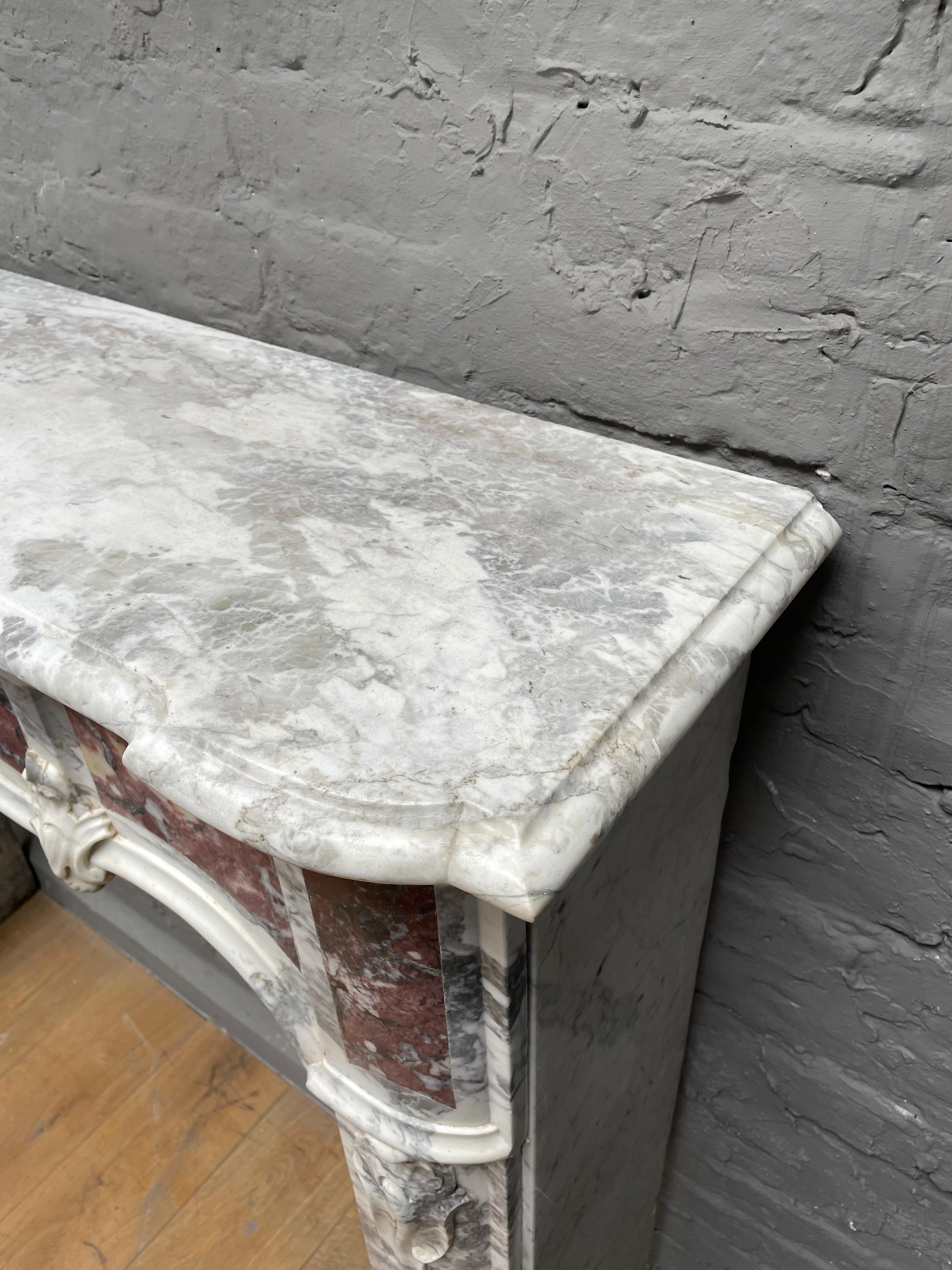 Breccia Marble An 18th Century Provincial Louis XV  Style Marble Fireplace Mantel For Sale