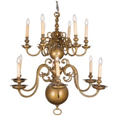 An 18th Century Twelve-Light Dutch Brass Two-Tier Chandelier