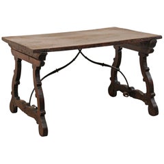 An 18th Century Walnut Wood Trestle Table with Arched Iron Stretcher from Italy