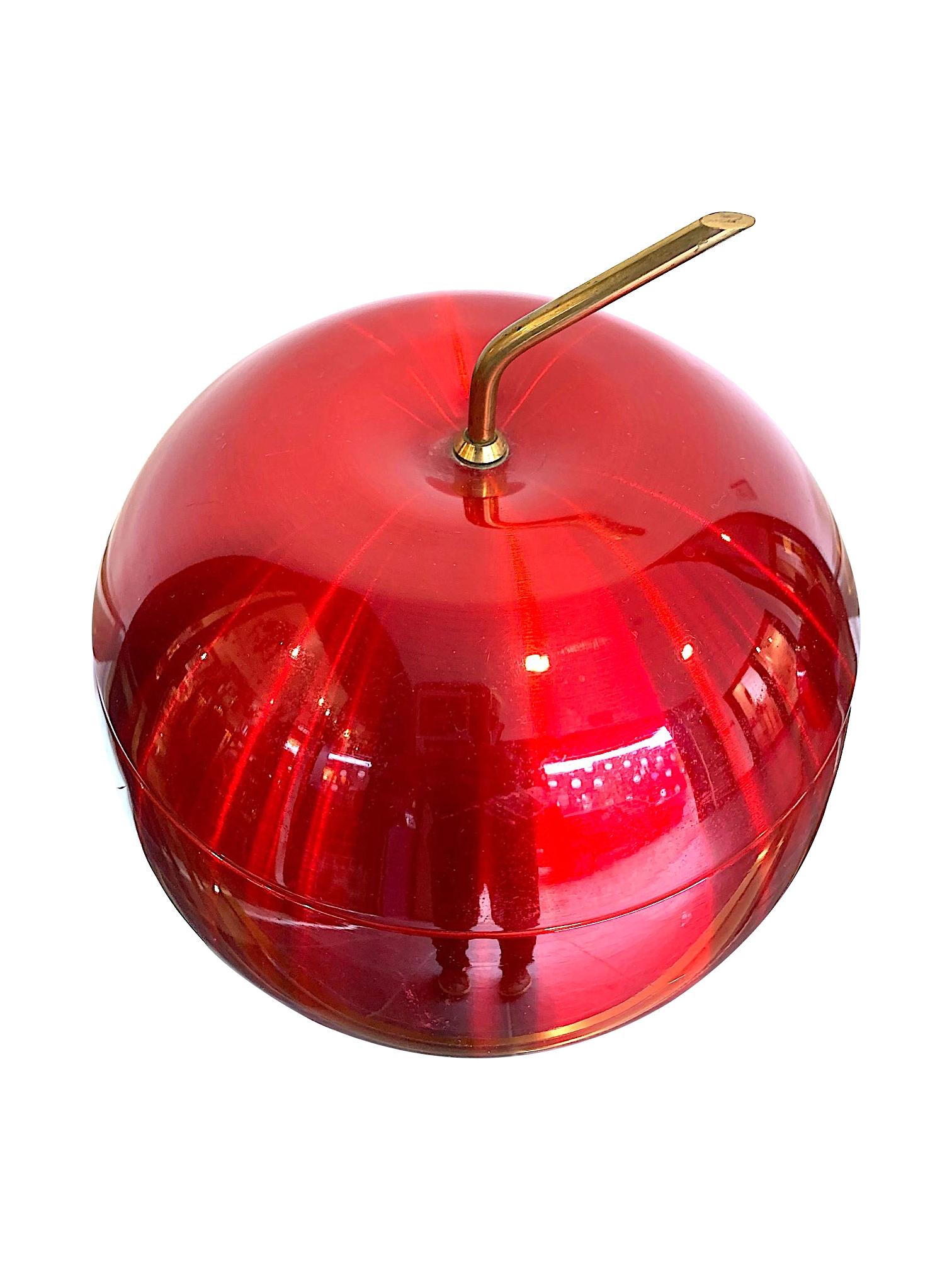 A fabulous 1970s cherry ice bucket by Daydream, Australia in vibrant red anodised metal with brass stalk handle. With Aluminium lining and separate internal lid. Stamped on the underside 