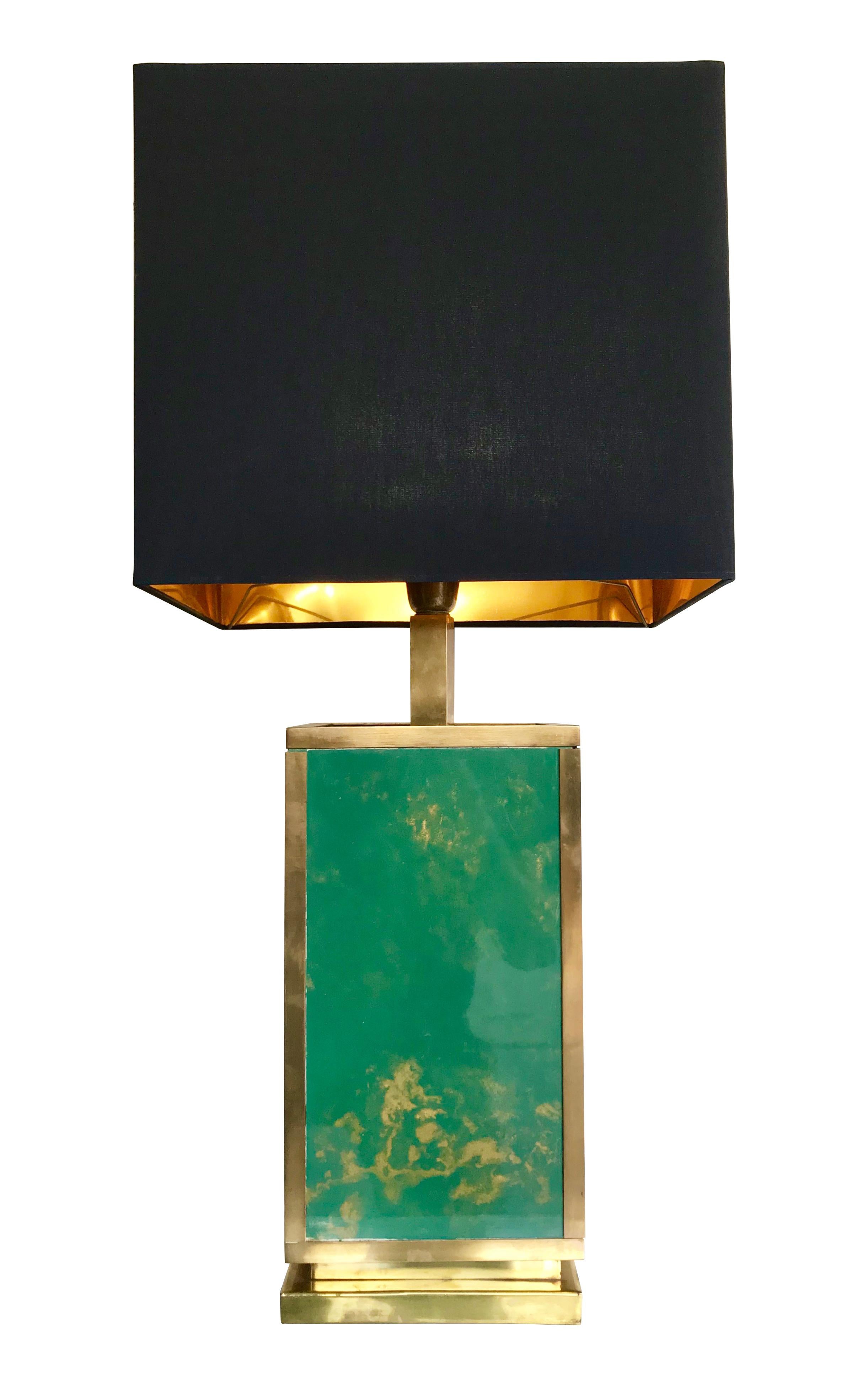 An large 1970s Italian brass lamp with green glass sides with gold swirling detail on the glass. With new black silk shade with gold lining. Re wired with antique gold flex and PAT tested.