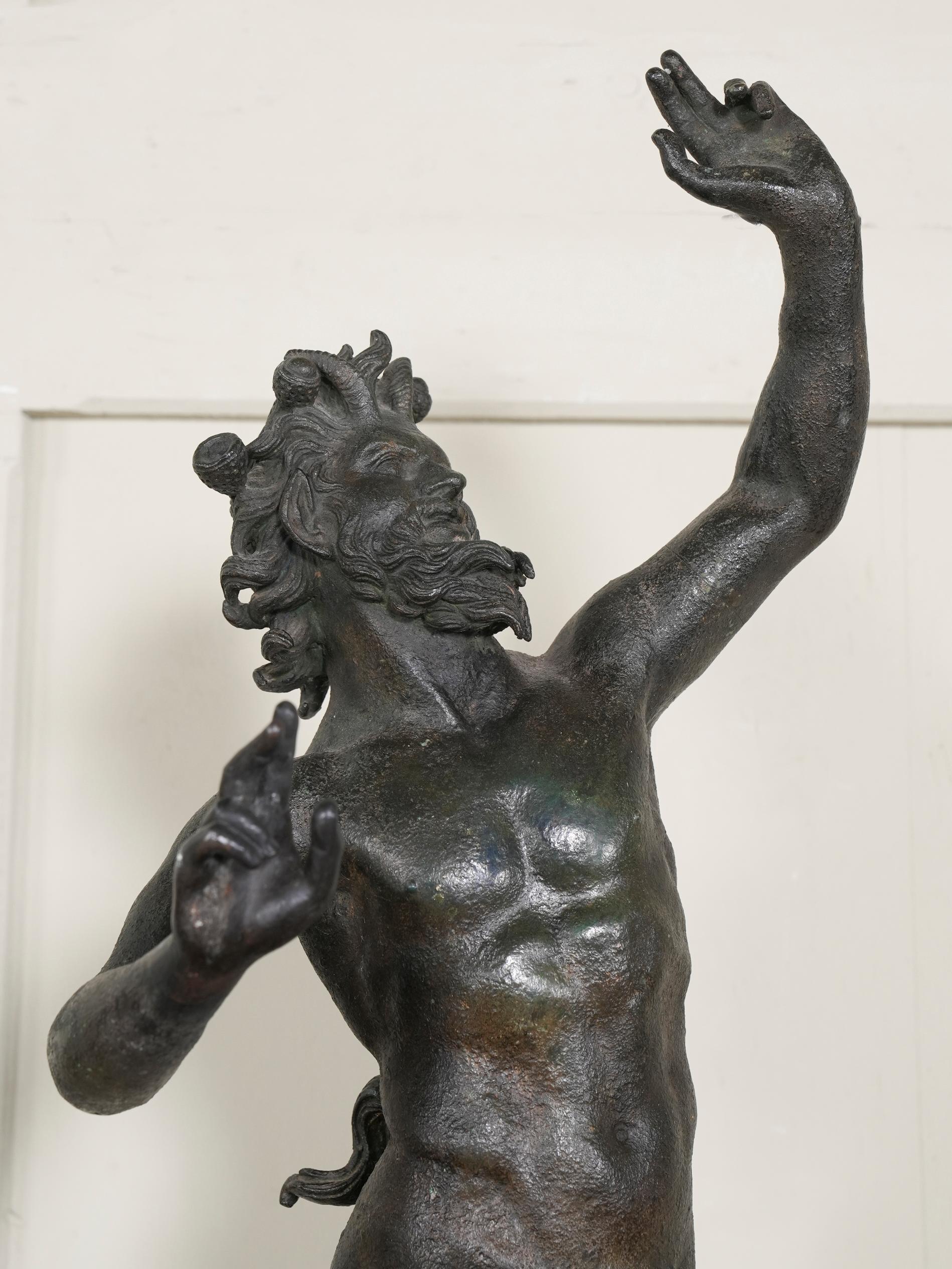 The large bronze figure of exceptional quality, colour and surface patination.

Signed to the base 