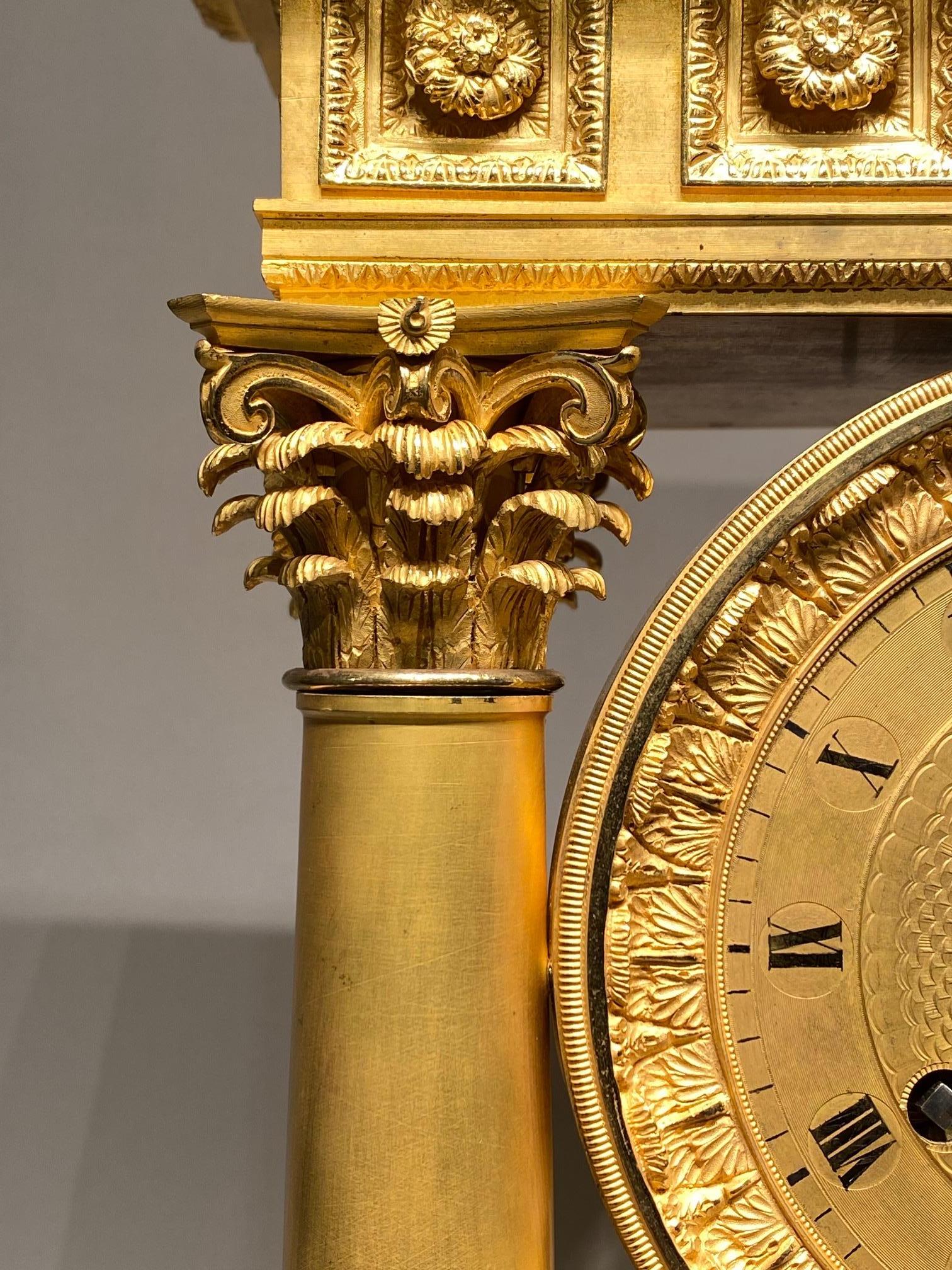 Carlo X An 19th century ormolu Charles X clock garniture set. in vendita