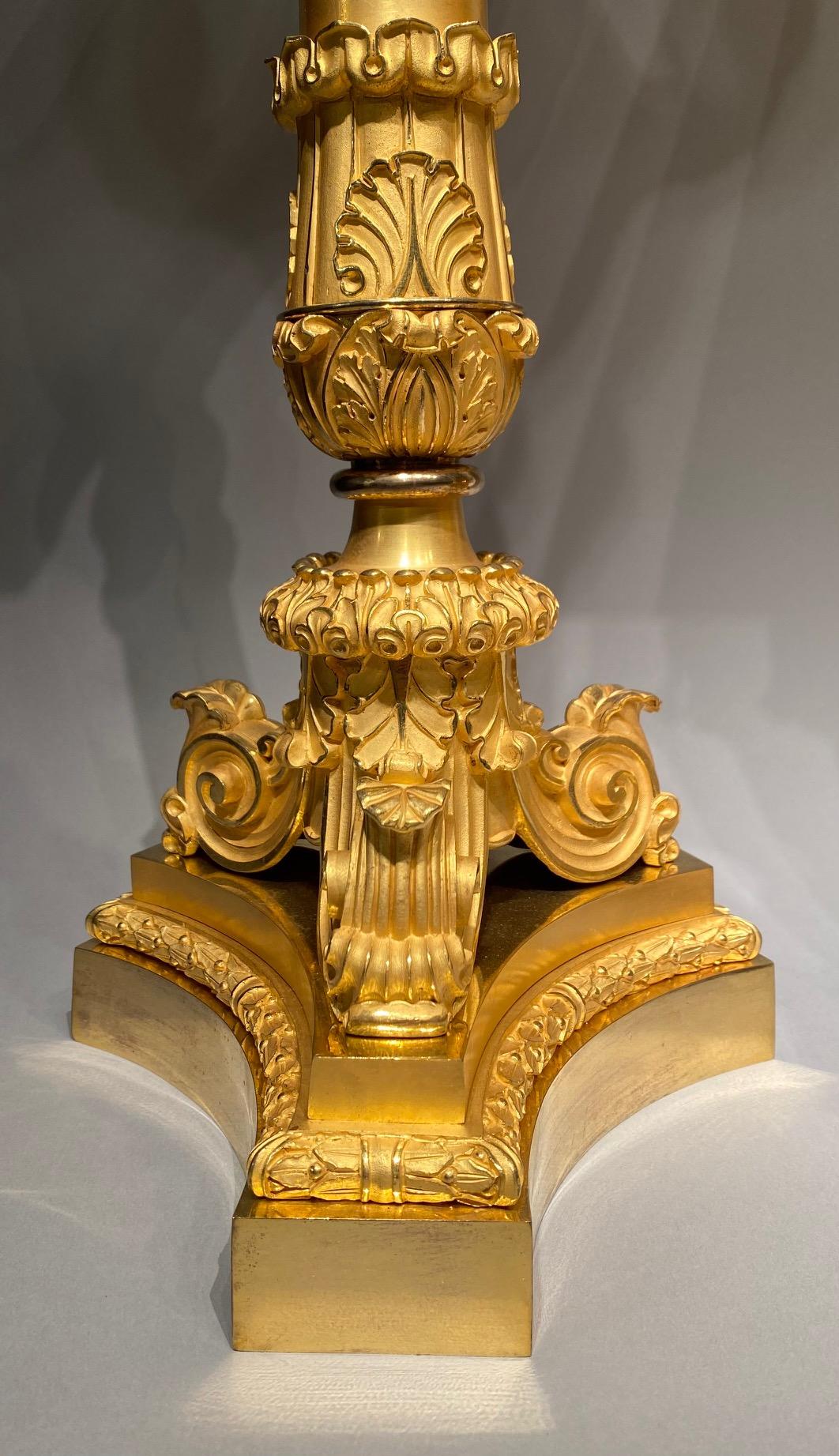 Similoro An 19th century ormolu Charles X clock garniture set. in vendita