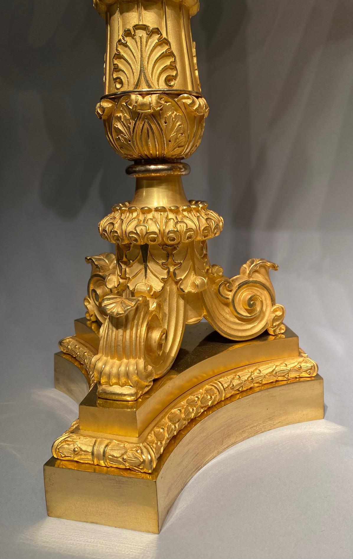 An 19th century ormolu Charles X clock garniture set. in vendita 1