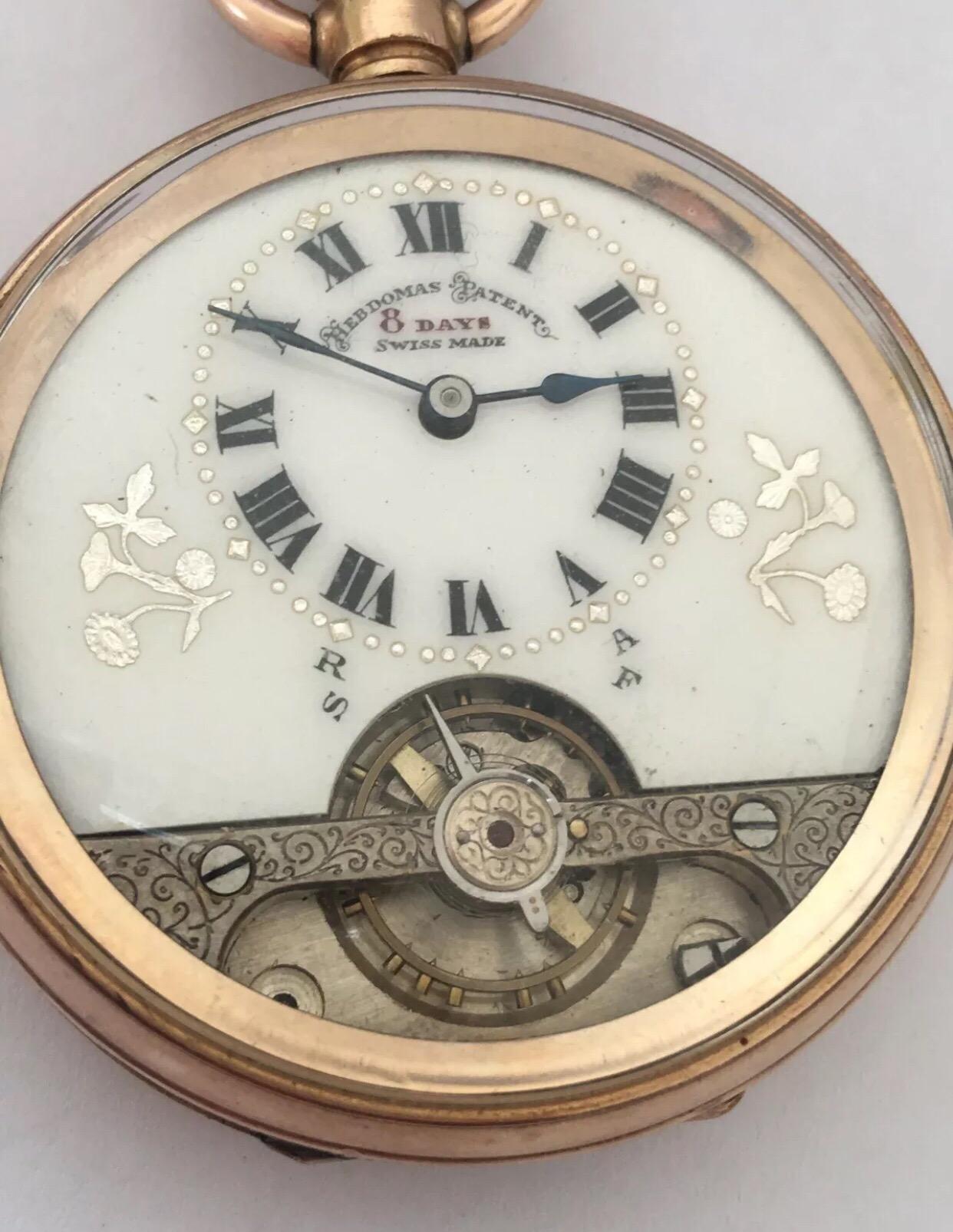 An 8 Days Swiss Made Hebdomas Visible Escapement Gold-Plated Pocket Watch 4