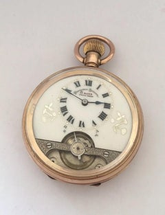 An 8 Days Swiss Made Hebdomas Visible Escapement Gold-Plated Pocket Watch