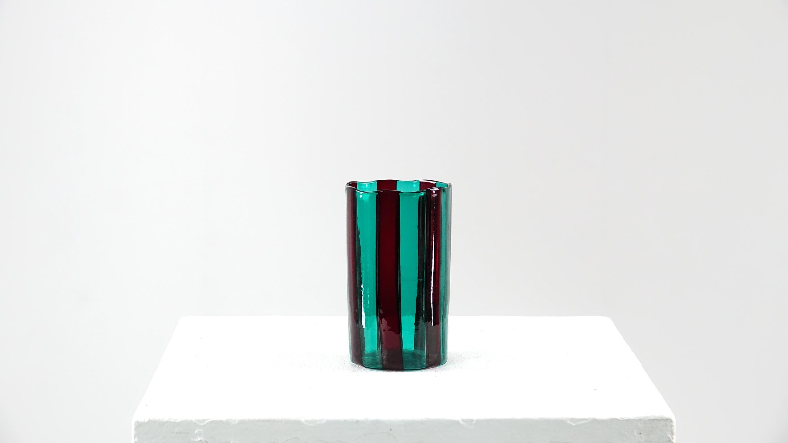 An “a fasce verticali” vase in the manner of Venini

Beautiful Murano vase Italy. Wonderful colors in red and green.

  