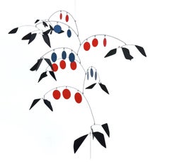 An Abstract Kinetic Mobile Sculpture in Red Blue and Black by Arthur Bauman 1977
