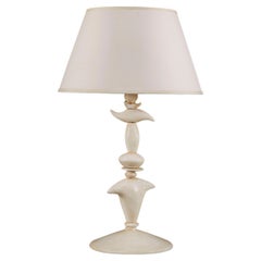 An Abstract White Painted Terracotta Table Lamp