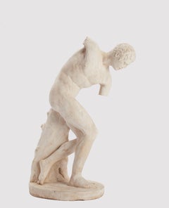 An academic cast of a sculpture depicting a discus thrower, Italy 1890.