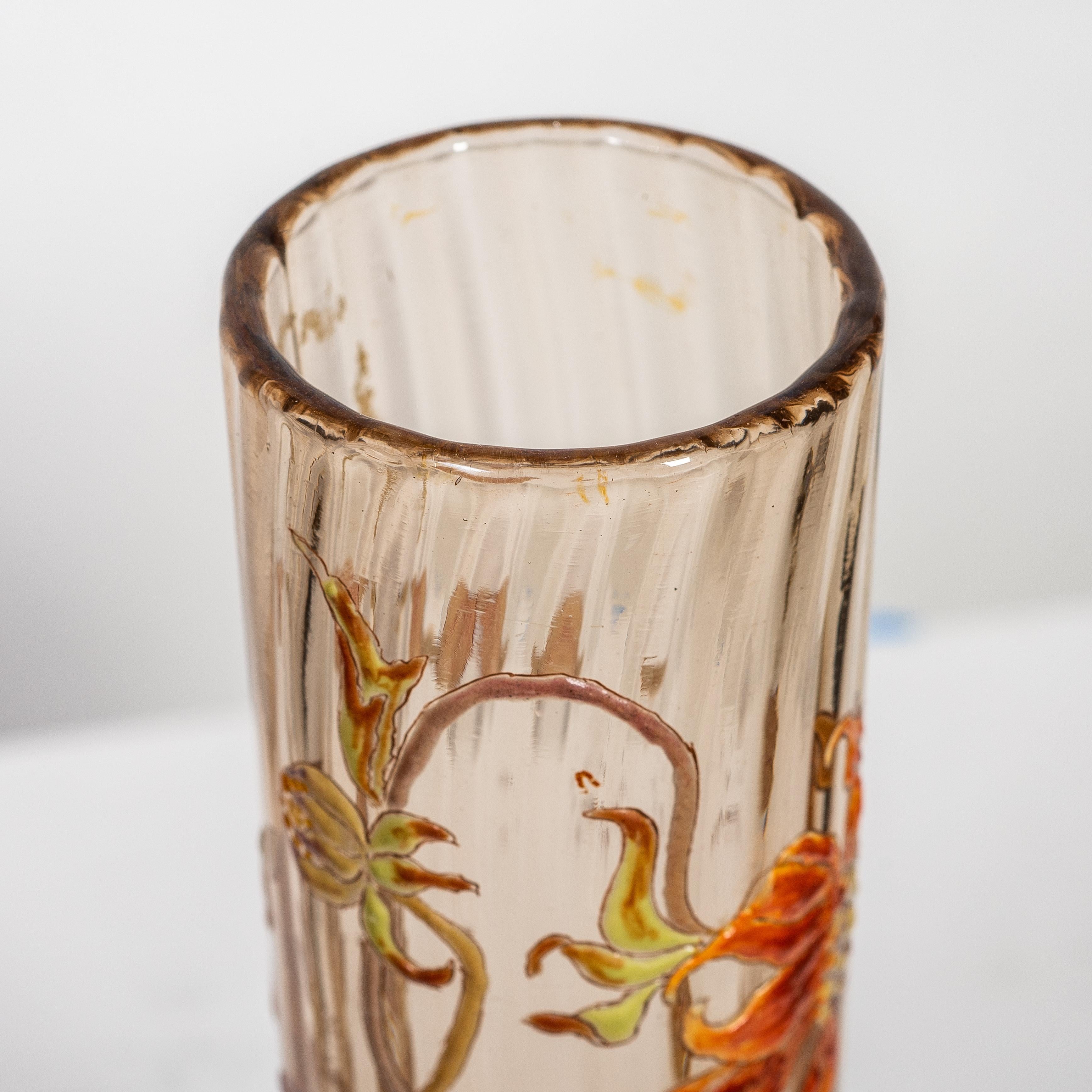 
Émile Gallé (1846-1904)
An Acid-Etched Enameled and applied Galle Glass Vase,
France, circa 1884-1889
etched mark and text 'Cristallerie de Gallé Nancy, modele et décor deposes', 
Width 3 in. (7.8 cm.) 
Height 7.67 in. (19.5 cm.)