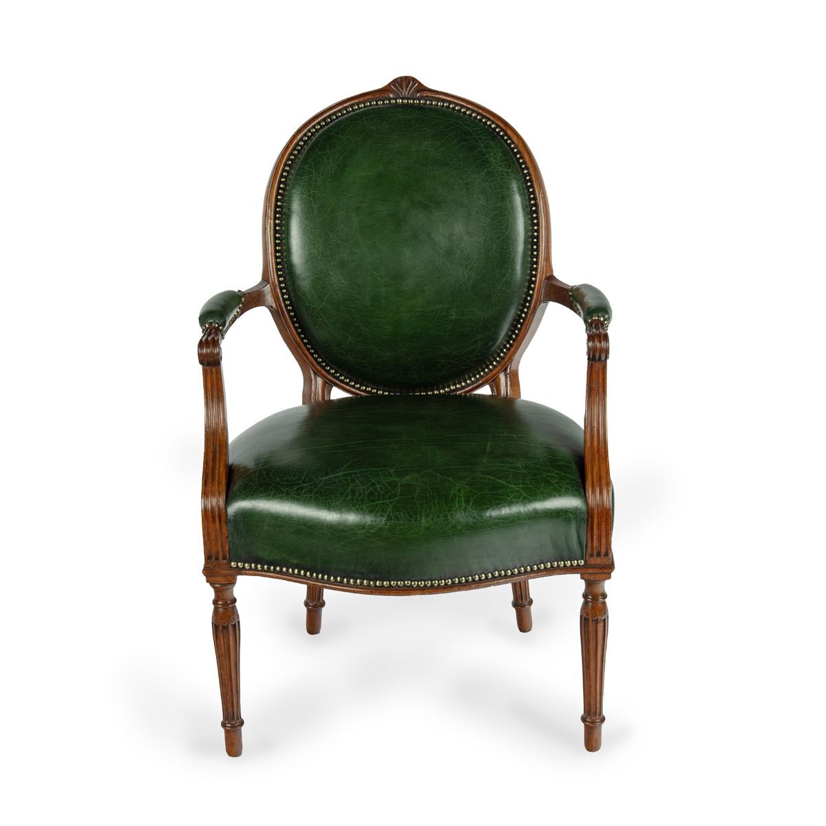 Sillón de la época de Adam, perteneciente a la suite fabricada para el duque de Newcastle en Clumber Park hacia 1775, de diseño Hepplewhite, con respaldo ovalado centrado en un antemuro, brazos acanalados curvados, todo ello elevado sobre finas