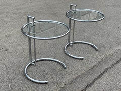 An adjustable set of 1980´s sidetables or Night Stands in chrome and glass