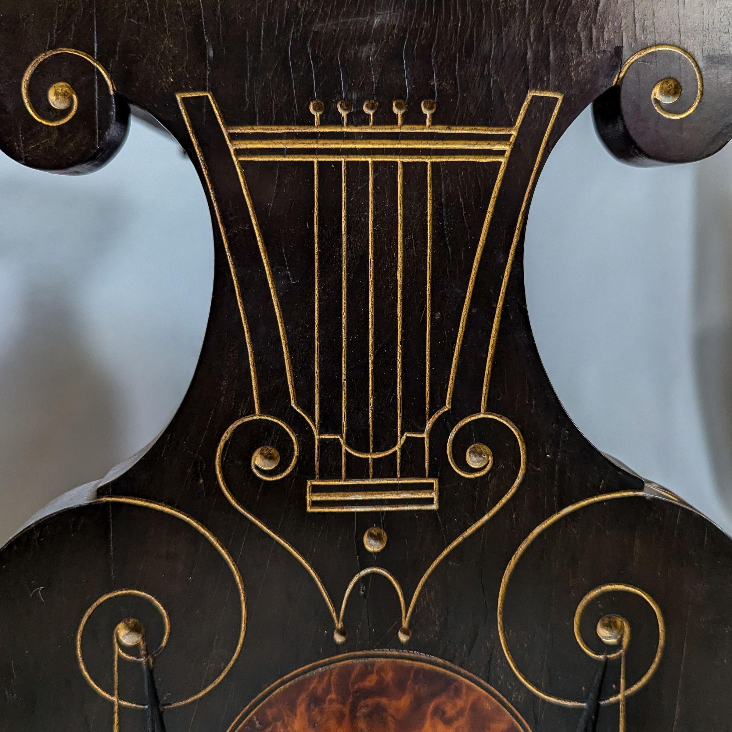 An Aesthetic Movement Amboyna and Ebonized Music Cabinet with gilt decoration For Sale 8