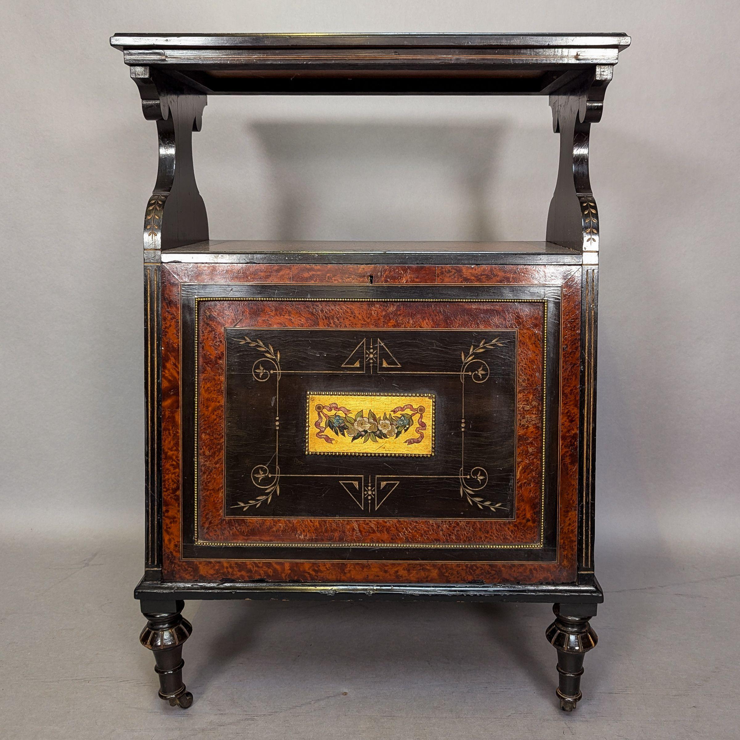 British An Aesthetic Movement Amboyna and Ebonized Music Cabinet with gilt decoration For Sale