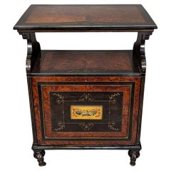 Antique An Aesthetic Movement Amboyna and Ebonized Music Cabinet with gilt decoration