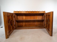 Aesthetic Movement Ash & fiddle back Ash wall cabinet inlaid with floral panels.