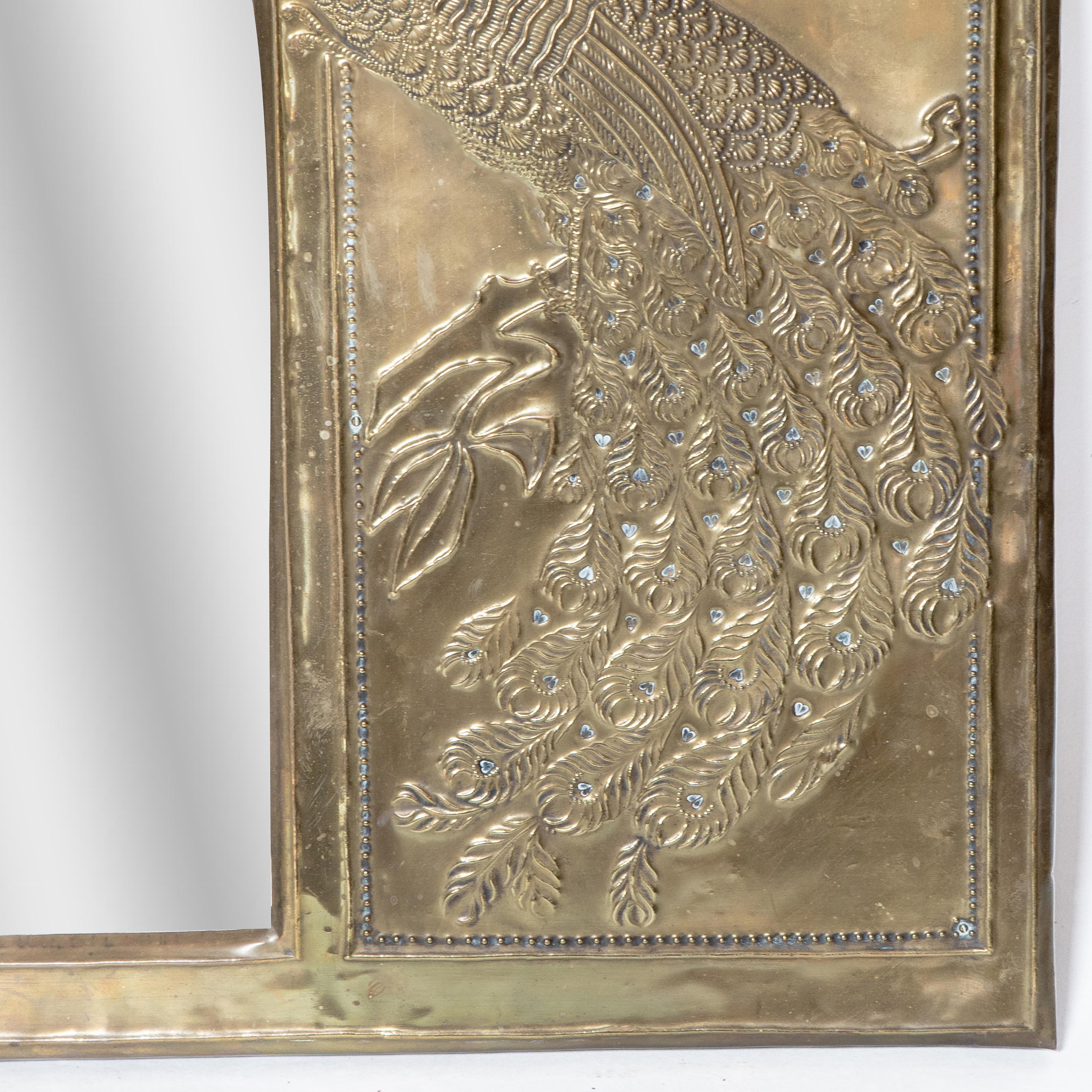An Aesthetic Movement brass mirror with stylized peacocks perched on a branch For Sale 4