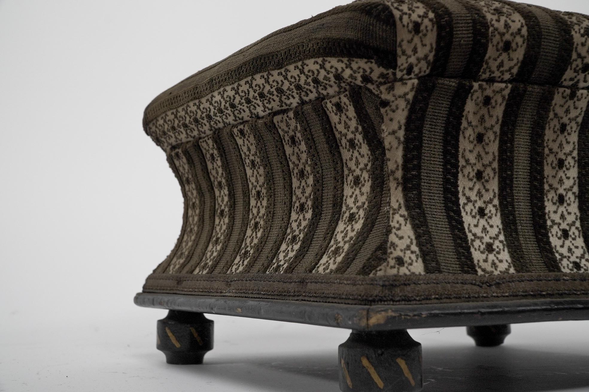 An Aesthetic Movement ebonized & gilded foot stool with striped upholstery. In Good Condition For Sale In London, GB