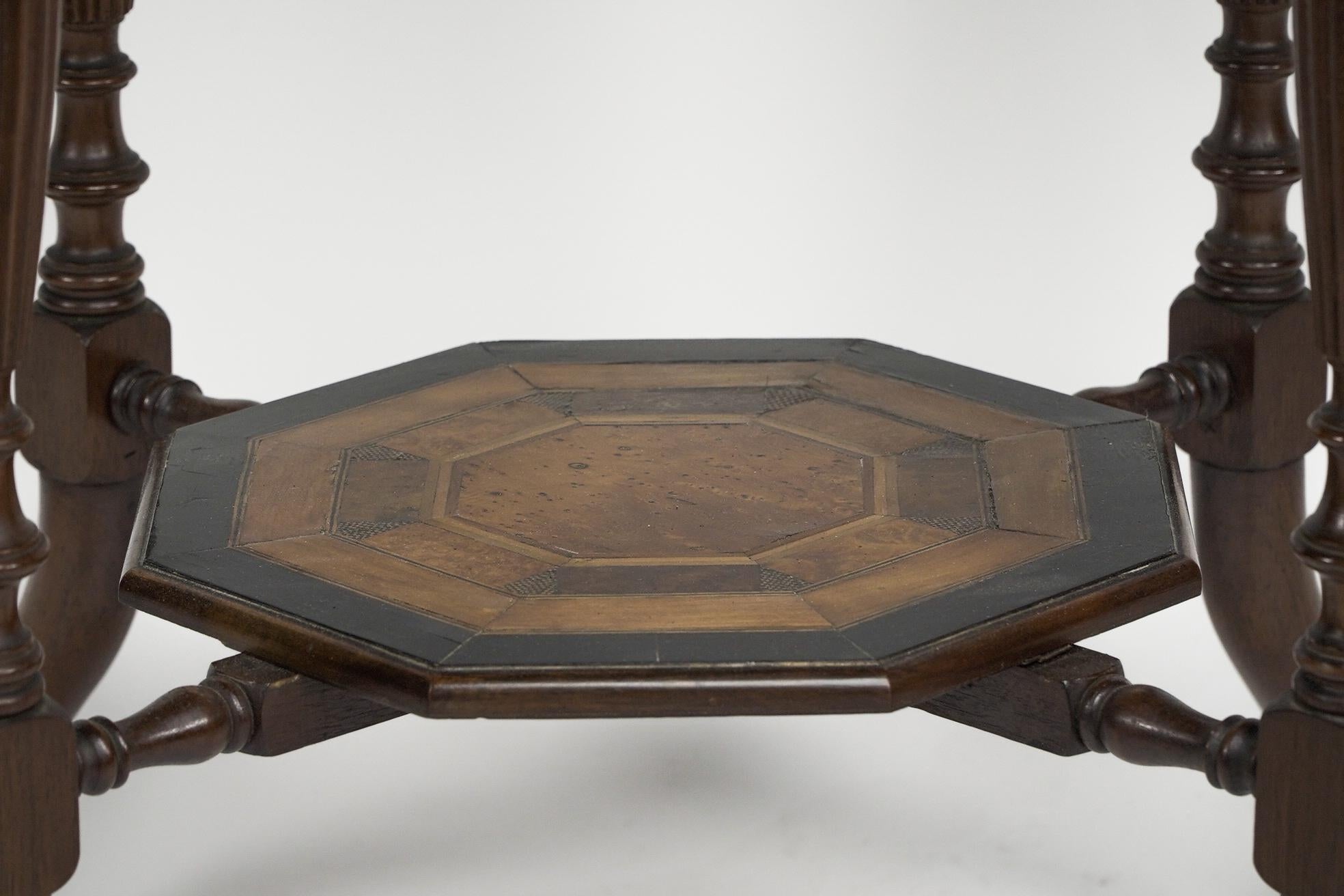 An Aesthetic Movement ebonized side table with a marquetry octagonal top For Sale 7