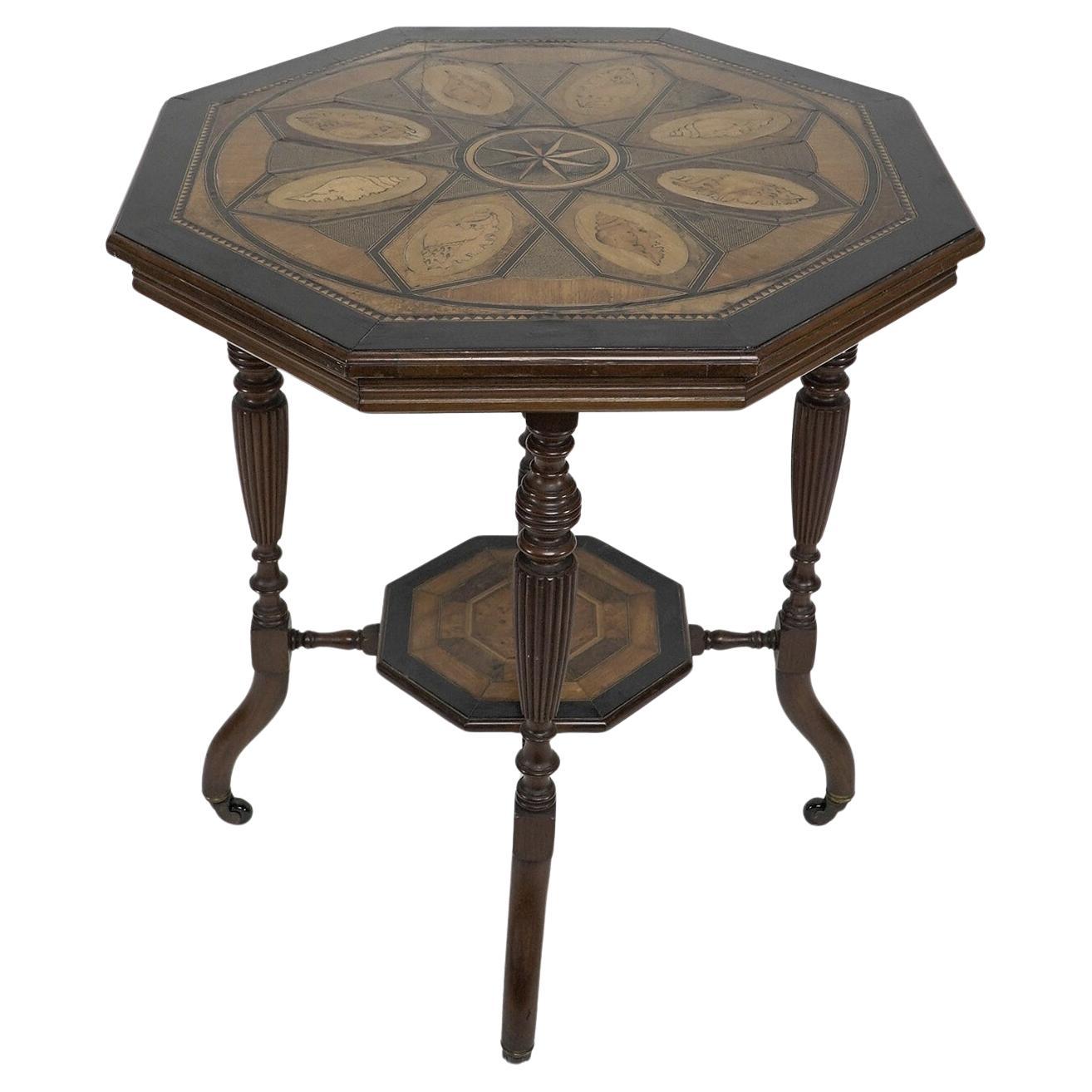 An Aesthetic Movement ebonized side table with a marquetry octagonal top For Sale