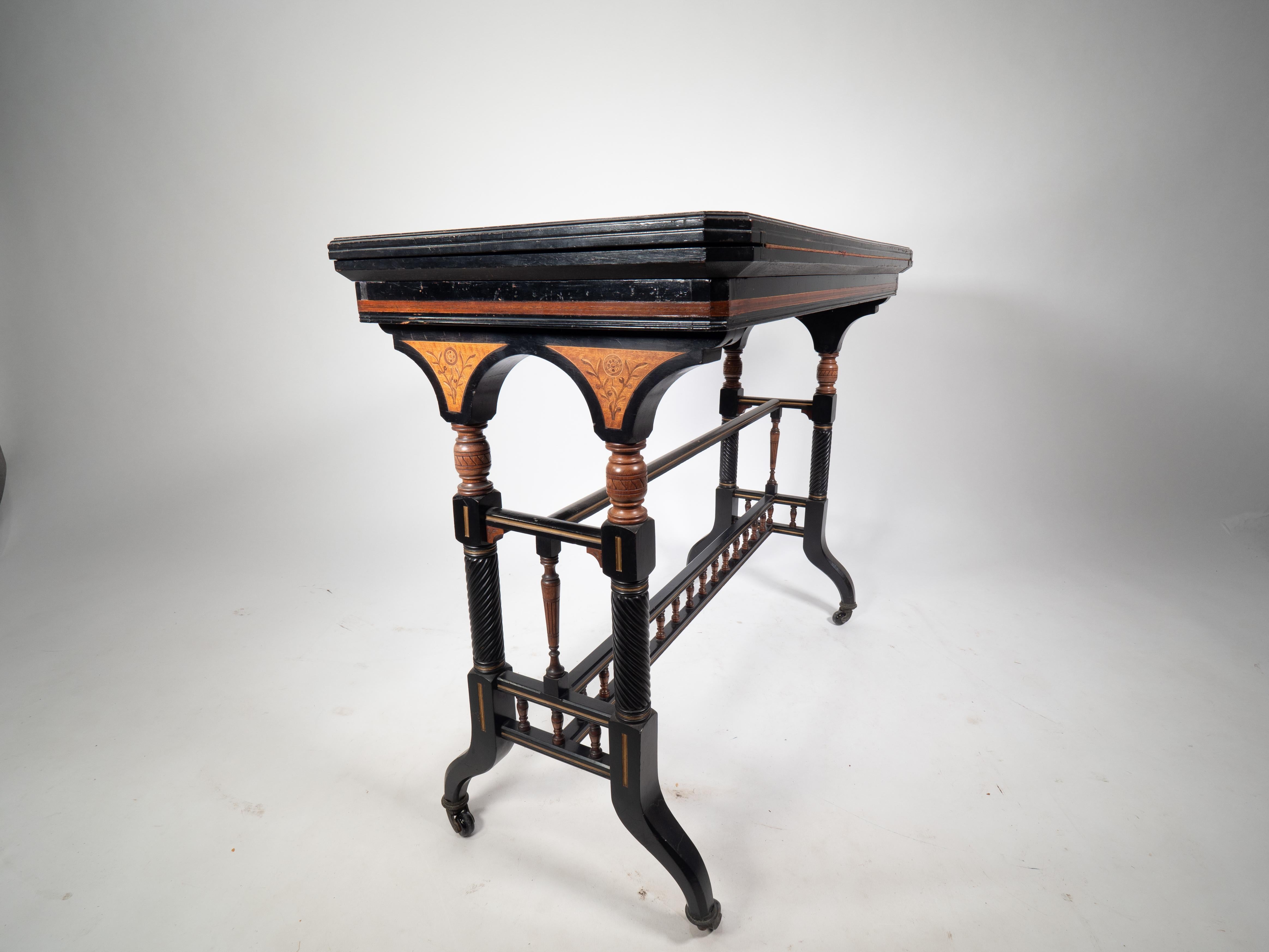 Gillows attr An Aesthetic Movement ebonized & fold over floral inlaid card table For Sale 3