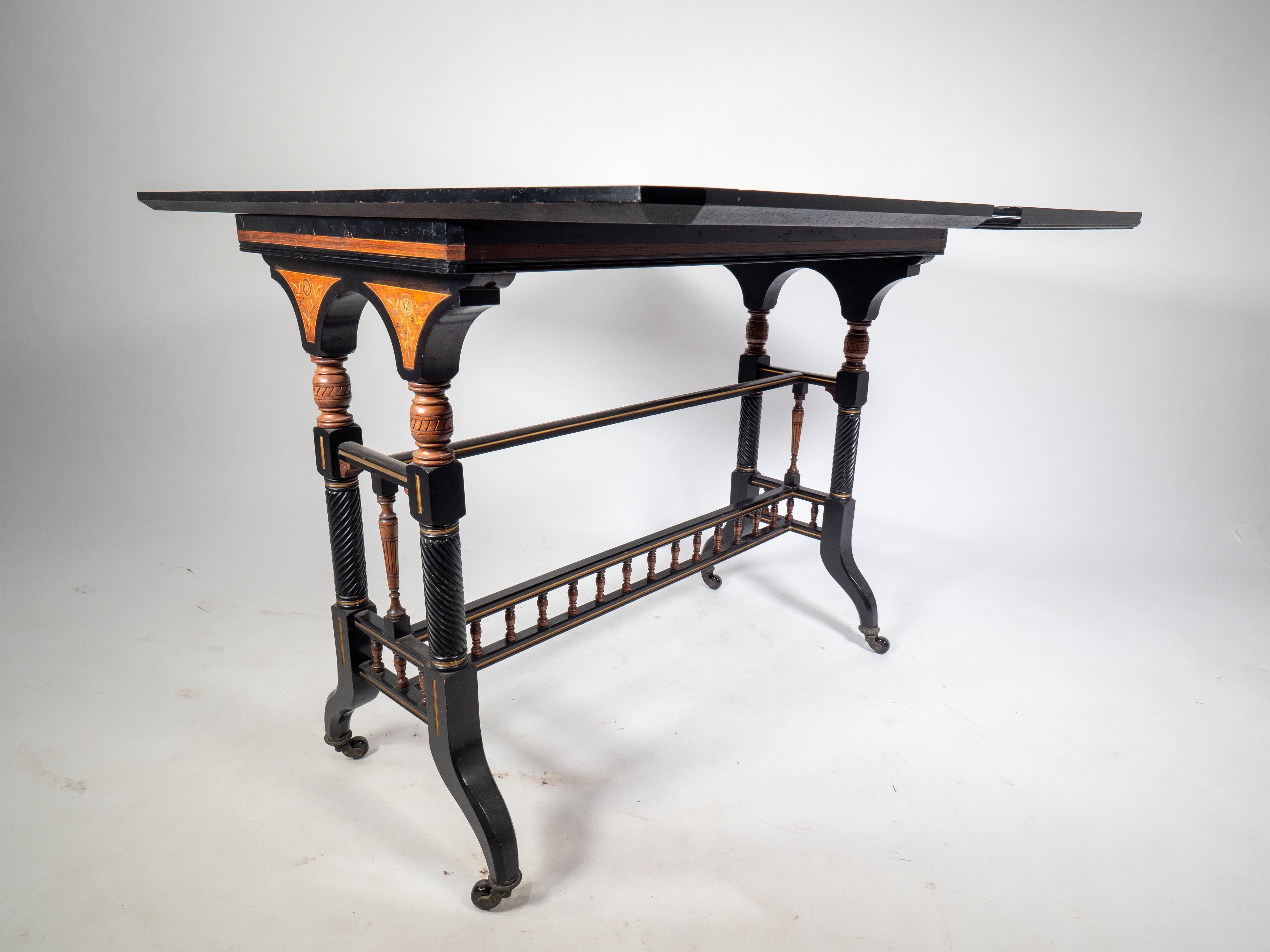 Gillows attr An Aesthetic Movement ebonized & fold over floral inlaid card table For Sale 11