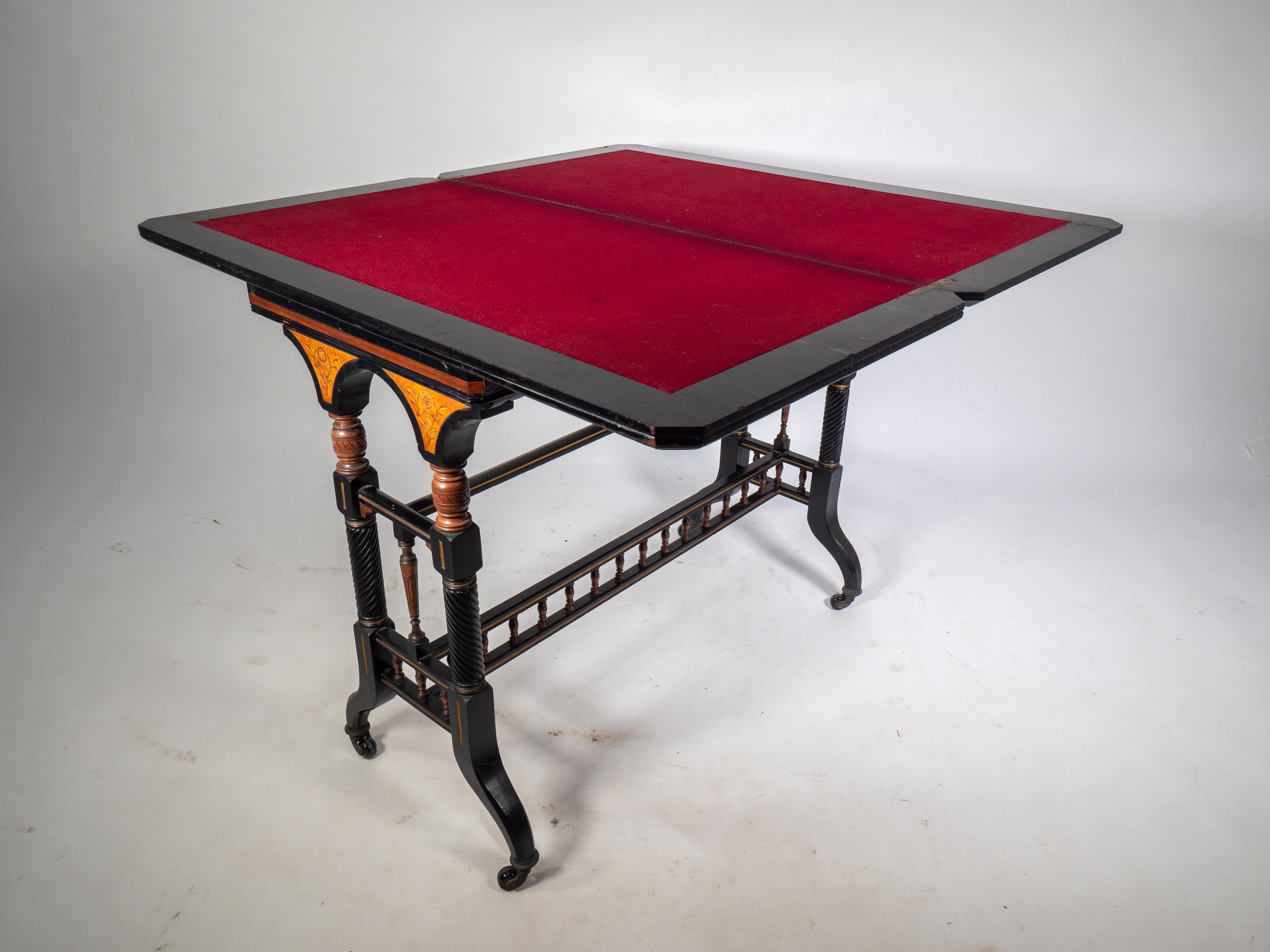 Gillows attr An Aesthetic Movement ebonized & fold over floral inlaid card table For Sale 12